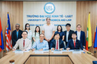 Đại diện 4 phòng thí nghiệm về AI ký hợp tác về phối hợp nghiên cứu, chuyển giao công nghệ. Ảnh: Gia Phúc.